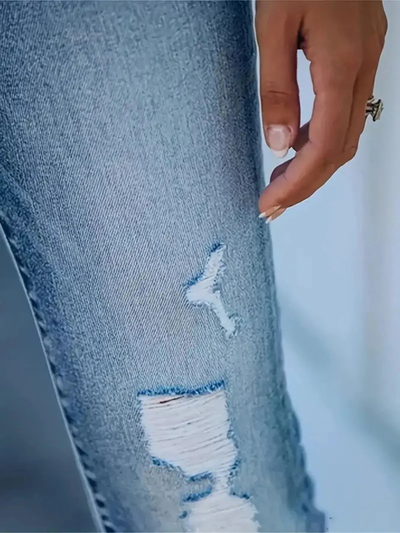 High-Waisted Distressed Skinny Jeans